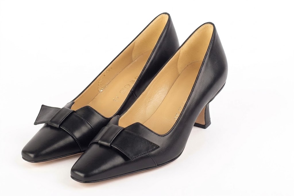 Women's black bow pumps with almond toe and mid spool heel - Front view